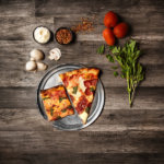 IN COMPARISON; DETROIT PIZZA AND A CLASSIC PIZZA SLICE